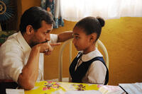 Jesse Borrego as Fabio and Amandla Stenberg as Young Cataleya in "Colombiana."
