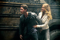 Shia LaBeouf as Sam Witwicky and Rosie Huntington-Whiteley as Carly Miller in "Transformers: Dark of the Moon."