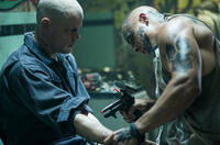 Matt Damon and Jose Pablo Cantillo in "Elysium."