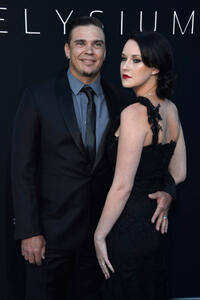 Brandon Auret and guest at the California premiere of "Elysium."