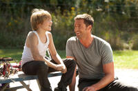 Dakota Goyo as Max and Hugh Jackman as Charlie Kenton in "Real Steel."