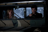 Ron Eldard as Louis Dainard and Kyle Chandler as Jackson Lamb in "Super 8."