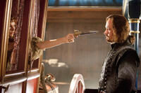 Milla Jovovich as Milady de Winter and Matthew MacFadyen as Aramis in "The Three Musketeers."
