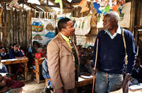 Vusi Kunene as Mr. Kipruto and Oliver Litondo as Maruge in "The First Grader."