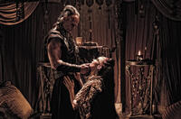 Stephen Lang as Khalar Zym and Rose McGowan as Marique in "Conan the Barbarian."