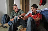 Alex Kendrick as Adam Mitchell and Rusty Martin as Dylan in "Courageous."