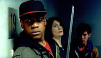 John Boyega as Moses and Jodie Whittaker as Sam in "Attack The Block."