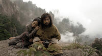 Zhou Xun as Ying and Vincent Zhao as Su Can in "True Legend."