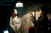 Mia Wasikowska and director Park Chan-wook on the set of "Stoker."
