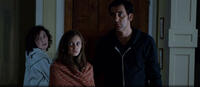Carice van Houten as Sue Farrow, Ella Purnell as Mia Farrow and Clive Owen as John Farrow in "Intruders."