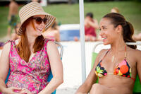 Alyson Hannigan as Michelle Flaherty and Dania Ramirez as Trisha in "American Reunion."