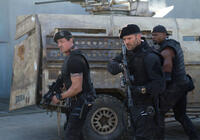 Sylvester Stallone as Barney Ross, Jason Statham as Lee Christmas and Terry Crews as Hale Caesar in "The Expendables 2."