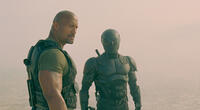 Dwayne Johnson as Roadblock and Ray Park as Snake Eyes in "G.I. Joe: Retaliation."