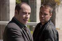 John Travolta and Taylor Kitsch in "Savages."