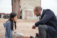 Catherine Chan as Mei and Jason Statham as Luke Wright in "Safe."