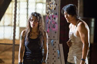 Sarah Shahi as Lisa and Kang Sung as Taylor Kwon in "Bullet To The Head."