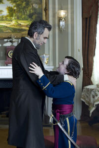 Daniel Day-Lewis as president Abraham Lincoln and Gulliver McGrath as Tad Lincoln in "Lincoln."