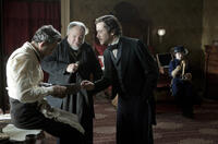 Daniel Day-Lewis as Abraham Lincoln, Stephen McKinley Henderson as William Slade, Joseph Gordon-Levitt as Robert Todd Lincoln and Gulliver McGrath as Tad Lincoln in "Lincoln."