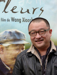 Director Wang Xiaoshuai on the set of "11 Flowers."