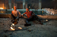 Bruce Willis as John McClane and Jai Courtney as John Genarro in "A Good Day to Die Hard."