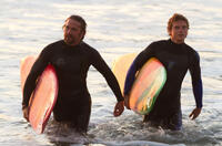 Gerard Butler as Frosty Hesson and Jonny Weston as Jay Moriarity in "Chasing Mavericks."