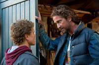 Jonny Weston as Jay Moriarity and Gerard Butler as Frosty Hesson in "Chasing Mavericks."