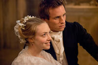 Amanda Seyfried as Cosette and Eddie Redmayne as Marius in "Les Miserables."