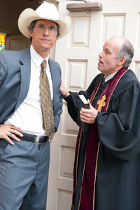 Matthew McConaughey as Danny Buck Davidson and Larry Jack Dotson as Reverend Woodward in "Bernie."