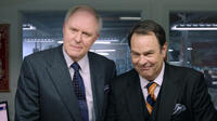 John Lithgow as Glenn Motch and Dan Aykroyd as Wade Motch in "The Campaign."