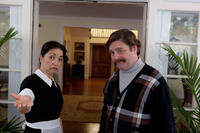 Karen Maruyama as Mrs. Yao and Zach Galifianakis as Marty Huggins in "The Campaign."
