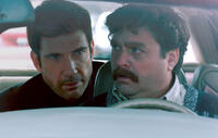 Dylan McDermott as Tim Wattley and Zach Galifianakis as Marty Huggins in "The Campaign."