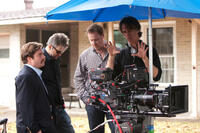 Zach Galifianakis, A-camera/stedicam operator George Bianchini, writer Chris Henchy and director Jay Roach on the set of "The Campaign."
