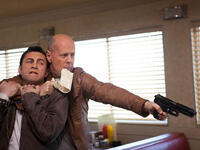 Joseph Gordon-Levitt and Bruce Willis as Joe in "Looper."