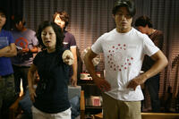 Director Christine Yoo and Brian Tee on the set of "Wedding Palace."