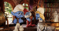 Narrator Smurf voiced by Tom Kane, Papa Smurf voiced by Jonathan Winters and Smurfette voiced by Katy Perry in "The Smurfs 2."