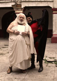 Ernesto Yanez as God and Joaquin Cosio as Agente Jesus Juarez in "Pastorela."
