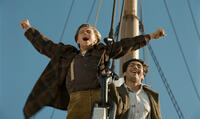 Leonardo DiCaprio as Jack Dawson and Danny Nucci as Fabrizio in "Titanic."