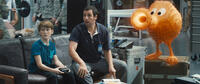 Matthew Lintz as Matt and Adam Sandler as Sam Brenner in "Pixels."