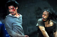Doni Alamsyah as Andi and Yayan Ruhian as Mad Dog in "The Raid."