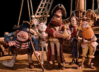 Pirate with Gout voiced by Brendan Gleeson, Albino Pirate voiced by Russell Tovey, Pirate Captain voiced by Hugh Grant, Pirate with Scarf voiced by Martin Freeman and Surprisingly Curvaceous Pirate voiced by Ashley Jensen in "Pirates! Band of Misfits."
