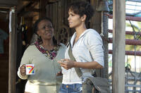 Thoko Ntshinga as Zukie and Halle Berry as Kate in "Dark Tide."