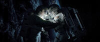 Sandra Bullock as Ryan Stone and George Clooney as Matt Kowalski in "Gravity."