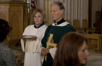 Kathleen Turner as Eileen Cleary and Richard Chamberlain as Monsignor Murphy in "The Perfect Family."