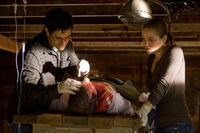 Jesse Metcalfe as Craig Landry, Bill Lippincott as Galligan and Erika Christensen as Elise Landry in "The Tortured."