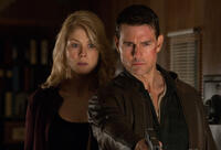 Rosamund Pike as Helen and Tom Cruise as Reacher in "Jack Reacher."