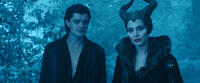 Sam Riley as Diaval and Angelina Jolie as Maleficent in "Maleficent."