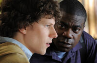 Jesse Eisenberg as Eli and Tracy Morgan as Sprinkles in "Why Stop Now."