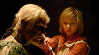 Malcolm McDowell and Adelaide Clemens in "Silent Hill: Revelation."