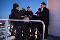 Director Joe Russo, director Anthony Russo and Chris Evans on the set of "Captain America: The Winter Soldier."