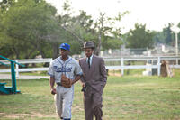 Chadwick Boseman as Jackie Robinson and Andre Holland as Wendell Smith in "42."